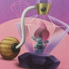 an image of a glass bottle with a small figure inside and a ball in the middle