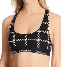 If you're mad for plaid, this windowpane patterned pullover bralette will fit the bill. Wireless cups are lined with same fabric for a light and breathable feel. Scoop neckline has a turned-and-stitched edge for a comfortable stretch fit. Flexible sewn-on logo elastic underband retains shape after many wearings. Tall sides and back are cotton/modal stretch blend with turned edge at top and underband at bottom. Wide stretch fabric straps have turned-and-stitched borders, and do not adjust. Straps Calvin Klein Bras, New Bra, Stretch Band, Bare Necessities, Black Bralette, Calvin Klein Woman, Bustiers, Calvin Klein Black, Black Fits