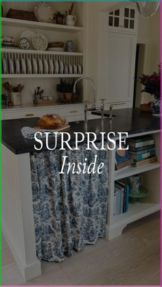 the words surprise inside in front of an image of a kitchen island with books on it