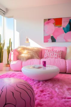 a living room filled with furniture and pink rugs on top of a pink floor