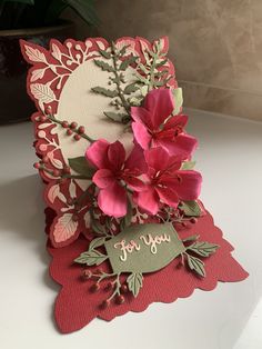 a close up of a card with flowers on it