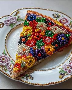 a piece of cake is decorated with beads