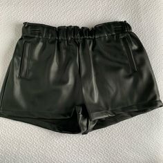 New With Tags Vegan Faux Leather Shorts. Size Medium With Elastic Waist. Pockets. An Amazing Texture- Look Like Real Leather! Pet Free/Smoke Free Home. Feel Free To Leave Any Questions In The Comments Below And I Will Be Happy To Answer. No Trades At This Time, Sorry! Purchase 2+ Items Together & Receive 10% Off Plus $7.11 Flat Rate Shipping. Just Click ‘Add To Bundle’ On Each Item You Would Like To Buy!! Casual Bottoms With Faux Front Pockets For Night Out, Casual Faux Leather Shorts For Going Out, Trendy High-waisted Leather Shorts, Trendy High-waist Faux Leather Shorts, Edgy Black Leather Shorts, Black Leather Edgy Shorts, High-waisted Faux Leather Shorts With Built-in Shorts, Faux Leather Shorts, Leather Shorts