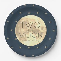 a paper plate with the words two the moon on it and stars in the background