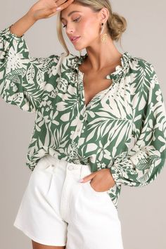 Introducing the Jungle Luxe Green Tropical Print Button Front Top! With a fierce and exotic print, this top will have you standing out in any crowd. The button front detail adds a touch of sophistication while the fabric keeps you comfortable all day long. Upgrade your style with this versatile piece! This top features a ruffled v-neckline, a button front, a lightweight material, and button cuffed long sleeves. 80% Rayon, 20% Linen Hand Wash Cold Unlined Manufactured in China Designed in USA Mod Sorority Rush Dresses, Rush Dresses, Cardigan Crop Top, Women's Button Down Shirt, Button Front Top, Friend Outfits, Long Crop Top, Little White Dresses, Upgrade Your Style