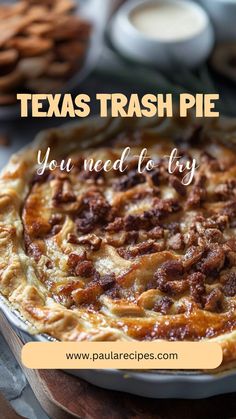 a close up of a pie on a plate with the words texas trash pie you need to try