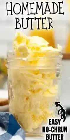 a jar filled with butter sitting on top of a table