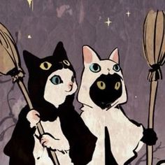 two black and white cats are holding brooms