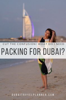 a woman standing on top of a sandy beach next to the ocean with text overlay that reads, cut the confusion what do i need packing for dubai?