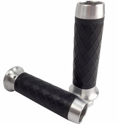 the black and silver handlebar grips are made from stainless steel, with an intricate diamond pattern