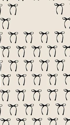 black and white bow tie pattern on a light gray background with the words,'i love