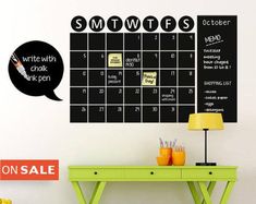 a chalkboard calendar wall decal in a child's room