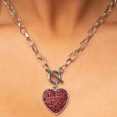 A Fiery Red Rhinestone Dotted Silver Heart Frame Sparkles From A Toggle Closure At The Center Of An Oval Silver Linked Chain For A Flirtatious Fashion. Features A Toggle Closure. Sold As One Individual Necklace. Includes One Pair Of Matching Earrings. Cheap Red Nickel-free Charm Necklaces, Red Necklace Set, Silver Link Chain, Red Necklace, Heart Frame, Fiery Red, Red Rhinestone, Silver Heart, Matching Earrings