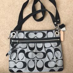 New Been Used! Black And Grey! Chic Coach Gray Shoulder Bag, Chic Gray Coach Shoulder Bag, Casual Black Coach Bag, Everyday Gray Coach Shoulder Bag, Chic Gray Coach Bag, Gray Coach Bags With Zipper Closure, Coach Gray Shoulder Bag For Shopping, Coach Purse, Coach Purses