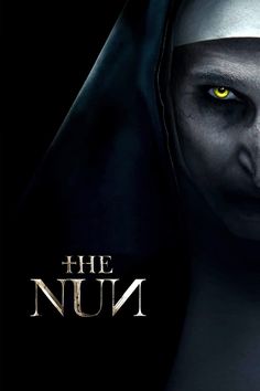 the nun movie poster with yellow eyes