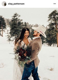 a man and woman standing next to each other in the snow