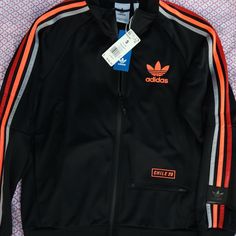 Adidas Chile 20 Size Small Brand New With Tags Fitted Black Urban Track Jacket, Spring Adidas Black Track Jacket, Adidas Urban Long Sleeve Track Jacket, Adidas Black Track Jacket For Spring, Adidas Urban Track Jacket For Winter, Adidas Urban Winter Track Jacket, Adidas Black Track Jacket For Winter, Urban Adidas Winter Track Jacket, Casual Black Track Jacket For Fall