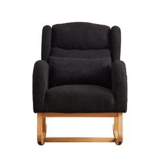 a black chair sitting on top of a wooden frame