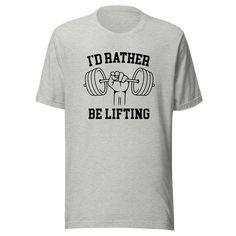 Are you looking for the perfect gift for the fitness enthusiast in your life? Look no further than the "I’d Rather Be Lifting" T-shirt from Kooskadoo! This stylish tee is perfect for any man who loves to hit the gym and lift weights. Whether they are into bodybuilding, powerlifting, or weightlifting, this T-shirt is sure to motivate them to reach their fitness goals.The I’d Rather Be Lifting T-shirt is made from high-quality activewear fabric, so it's comfortable and breathable. It's perfect for Athletic Heather Workout T-shirt, Athleisure Slogan T-shirt For Workout, Athletic Heather Crew Neck T-shirt For Gym, Slogan T-shirt For Workout Athleisure, Athleisure Slogan Workout T-shirt, Sporty Workout T-shirt With Slogan, Sporty Text Print T-shirt For Gym, Tri-blend Cotton T-shirt For Gym, Relaxed Fit Gym T-shirt With Text Print