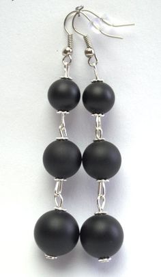 Simple and Elegant black Onyx drop earrings Elegant earrings made of high quality natural matt black onyx - simple and beautiful.This earrings is a good accessory for work or everyday use. Dress these up or down; a great basic.Most of my jewelry can easily be resized at no additional charge. I would love to assist you with your custom order, so please do not hesitate to contact with me.All my earrings is made with care and handmade.Earrings details:Length: Long dangle earrings measure 55 mm from Black Onyx Jewelry, Black Onyx Earrings, Opal Wedding Rings, Earrings Summer, Goth Jewelry, Onyx Jewelry, Onyx Earrings, Summer Boho, Earrings Elegant