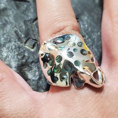 This beautiful ring of a sting ray is solid sterling silver and inlayed with genuine abalone. A very unique and artistic piece for anyone that loves sting rays. Unique Silver Shell Rings, Unique Shell-shaped Silver Jewelry, Unique Silver Shell-shaped Jewelry, Sting Rays, Key West Fl, Beautiful Ring, Stingray, Key West, Rings Statement