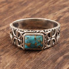 This handsome men's ring from Parul in India features ornamental motifs on the band that resemble ancient glyphs. Artisans craft the ring from sterling silver, deliberately oxidizing certain areas to highlight the detail. The band is set with a cabochon of composite turquoise. Daylight Ring, Mens Rings, Sterling Silver Mens Rings, Sterling Silver Rings Bands, Mens Silver Rings, Sterling Silver Mens, Silver Band Ring, Men's Ring, Men's Rings