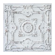 a white square with ornate designs on it