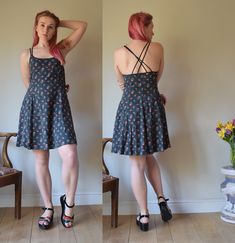 A gorgeous vintage sun dress, made by Kenzo Jungle in the 1990s  Made in France. 100% Viscose  (Rayon) Doubled satin spaghetti straps. Fastens with a zip to the side. Made of faded-look grey fabric with red flower sprigs.  In good vintage condition. There are some lightened up crease marks to the fron (please see the last picture for details), but everything else is very good. Marked as EU 40 (Uk size 12) but may come up small. Chest: 32" / 80cm Waist: 30" / 76cm Hips: Free Length: 34.5" / 87cm Vintage Summer Dresses With Spaghetti Straps, Vintage Spaghetti Strap Summer Dresses, Fitted Sundress With Ditsy Floral Print, Fitted Ditsy Floral Print Sundress, Vintage Fitted Sundress With Spaghetti Straps, Vintage Spring Dresses With Adjustable Straps, Vintage Dresses With Adjustable Straps For Spring, Retro Fitted Sundress For Garden Party, Vintage Fitted Dress With Adjustable Straps