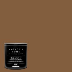 a can of brown paint with the words magnolia home on it's front and side