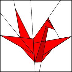 an origami bird is shown in red