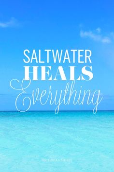 the words salt water heals everything are written in white on a blue ocean background