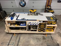 a workbench with many tools on it in a garage