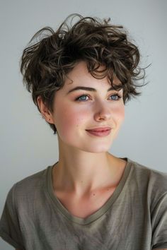 34 Gorgeous Curly Short Haircuts to Transform Your Look in 2024 – CreativeBooster Short Haircuts With Curly Hair, Short Curly Haircuts Over 50, Short Choppy Curly Hairstyles, Curly Short Haircuts, Pixie Cut Color, Feathered Pixie, Pixie Cut Curly Hair, Short Bleached Hair, 100 Hairstyles