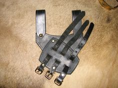 "Double 10oz black bridle leather designed to hold heavy swords. 4\"belt loops" Black Gothic Leather Harness, Leather Harness With Straps, Black Leather Harness With Belt Included, Black Leather Harness With Belt, Leather Strapped Harness With Belt, Gothic Leather Harness With Belt, Pirate Stuff, Leather Stamping, Futuristic Motorcycle