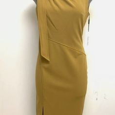 Calvin Klein Nwt But Has A Spot Underneath Arm - Can Likely Be Spot Treated Bow Detailing On Shoulder - Very Cute! Perfect For An Event Or A Wedding! Size 10 Retails For $134 Calvin Klein One Shoulder Dress, Dark Yellow, Calvin Klein Dress, Calvin Klein Dresses, Dress With Bow, Womens Calvin Klein, Sheath Dress, Calvin Klein, Size 10