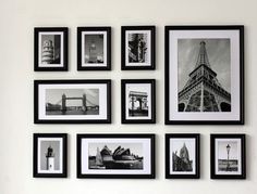 black and white photographs hanging on the wall