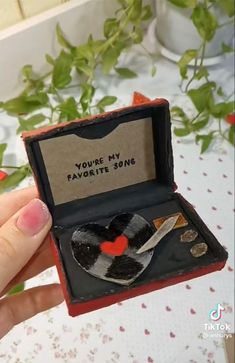 there is a small box with spoons in it that says you're my favorite song