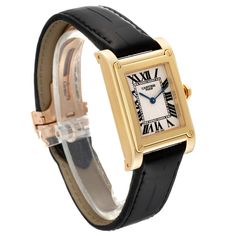 Cartier Tank a Vis Privee CPCP Collection Yellow Gold Mens Watch W1529451 Box Papers. Manual winding movement. 18k yellow gold case 27.0 x 30.0 mm. Octagonal crown set with faceted blue sapphire. . Scratch resistant sapphire crystal. Silvered guilloche dial with black Roman numerals. Sword-shaped blued steel hands. Secret Cartier signature at VII. Black leather strap with Cartier 18k yellow gold deployant clasp. Cartier Santos Watch Woman, Cartier Santos Watch, Cartier Calibre, Cartier Ballon Bleu, Cartier Santos, Gold Watch Men, Cartier Tank, Gold Case, Rolex Datejust