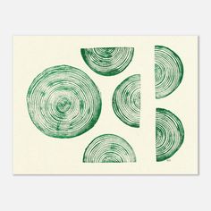 three green circles on white paper