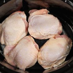 raw chicken and carrots in an electric pressure cooker