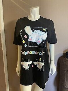 New CINNAMOROLL BY SANRIO SHORT SLEEVE GRAPHIC T-SHIRT BlACK  | eBay Candle Pedestal, Brands Outlet, Hot Topic, Womens Clothing Tops, Contact Us, Graphic T Shirt, Graphic Tshirt, Women Accessories, Things To Sell