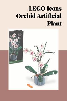 an orchid plant in a glass vase next to a box with the words lego icons orchid artificial plant