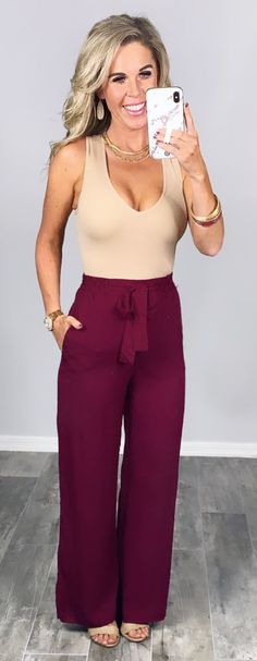 These light weight pants are perfect for year round. These have elastic at the waist and a tie. Dress these up or down but you are going to be so comfy in these laid back styles. Great for moms on the go or travel to the office. Amanda is 5'3, 32DD, Size 3/5 and is wearing the small. Casual Ankle-length Wide Leg Pants With Tie Waist, Versatile Tie Waist Pants For Loungewear, Chic Paperbag Waist Bottoms For Loungewear, Versatile Tie Waist Loungewear Pants, Versatile Loungewear Pants With Tie Waist, Casual Fall Pants With Tie Waist, Casual Tie Waist Pants For Fall, Casual Tie Waist Pants For Day Out, Casual Wide Leg Pants With Paperbag Waist For Work