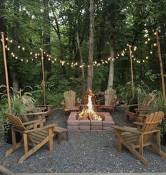 a fire pit surrounded by wooden chairs and lights