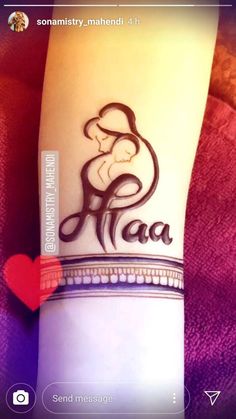 a woman's arm with tattoos on it and the word haa written in black ink