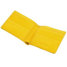 YELLOW GENUINE CROCODILE HORNBACK SKIN LEATHER BIFOLD WALLET  Hand-crafted item;  Made of genuine crocodile leather;   Cowhide interior ;    Full size: 4 3/8" x 3 5/8";   The wallet offers 10 credit card slots and 2 bill compartments.   Looking for a tidy and efficient way to organize your money and credit cards but don’t want to settle for a cookie-cutter wallet? We’ve got you covered with this Yellow Crocodile Hornback Wallet. Its vibrant color and luxurious exotic leather finishing will help Mens Wallets, Leather Bifold Wallet, Crocodile Leather, Bifold Wallet, Wallet Men, Credit Cards, Cookies Et Biscuits, Card Slots, Slots