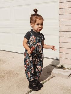 This adorable jumpsuit has a faux embroidered design. It is made with a gorgeous, silky custom printed rib knit material.  Rompers are made to pull over shoulders. With an adorable strappy bodice and slouchy bottom, this jumpsuit is so hip and stylish! Cute Toddler Outfits, Baby Style, Baby Dungarees Sewing Pattern, Baby Girl In Overalls, Baby Girl Dungarees Outfit, Baby Boy Dungarees, Kids Dungarees, Toddler Jumpsuit, Punk Baby