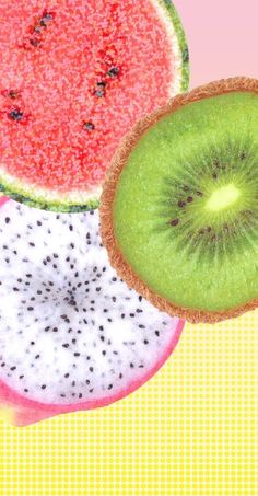 an apple, watermelon and kiwi slice on a pink yellow and green background