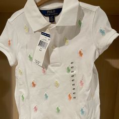 New With Ticket Polos For A 4 Year Girl Fitted Casual Shirt For Playtime, Casual Ralph Lauren T-shirt For Spring, Ralph Lauren Casual Spring T-shirt, White Ralph Lauren T-shirt With Graphic Print, Cute Ralph Lauren Long Sleeve Top, Casual Multicolor Ralph Lauren Tops, Ralph Lauren Multicolor Casual Tops, Ralph Lauren Multicolor Cotton Top, Cute Ralph Lauren Summer Tops