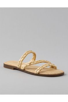 Raffia upper/Slip-on silhouette/Rubber outsole Brown Straw Slip-on Sandals, Woven Slip-on Sandals For Beach, Brown Non-slip Slides For The Beach, Brown Slip-on Slides With Woven Sole, Beach Slides With Braided Slip-on Straps, Flip Flop Sandals, Slide Sandals, American Eagle Outfitters, Women's Shoes Sandals